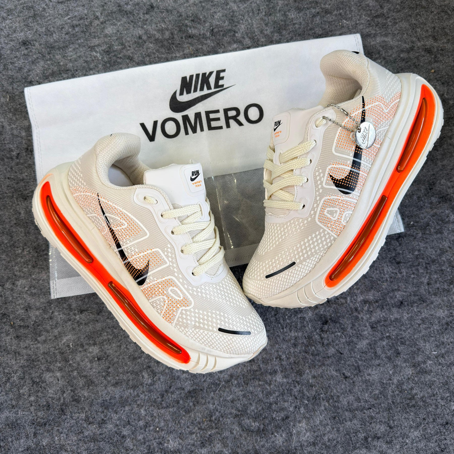 Tênis Vomero Premium - Laranja Off