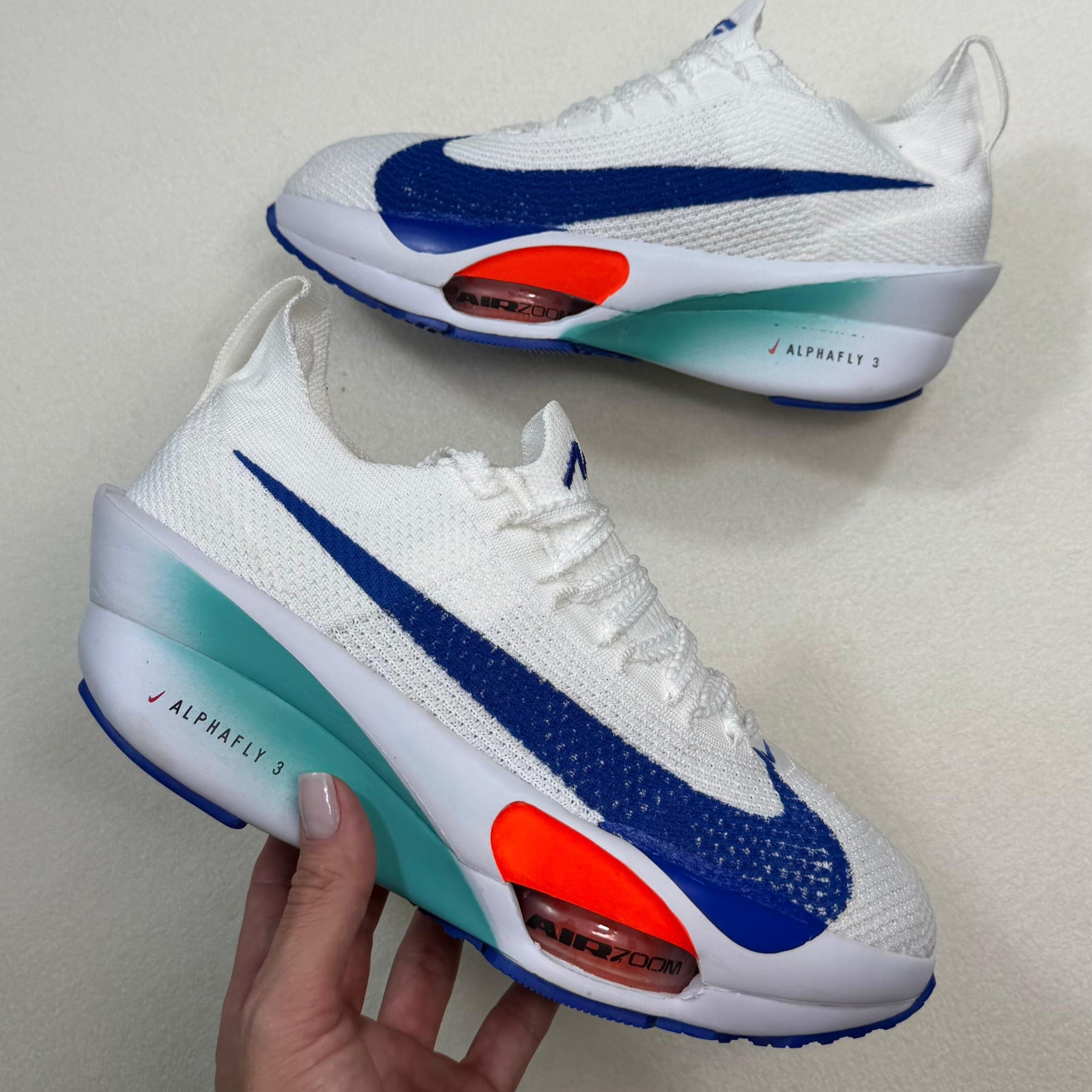 Tênis Nike Aphafly 3 - Branco / Azul / Laranja