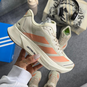 Tênis Adidas Boston 13 - Areia / Salmão