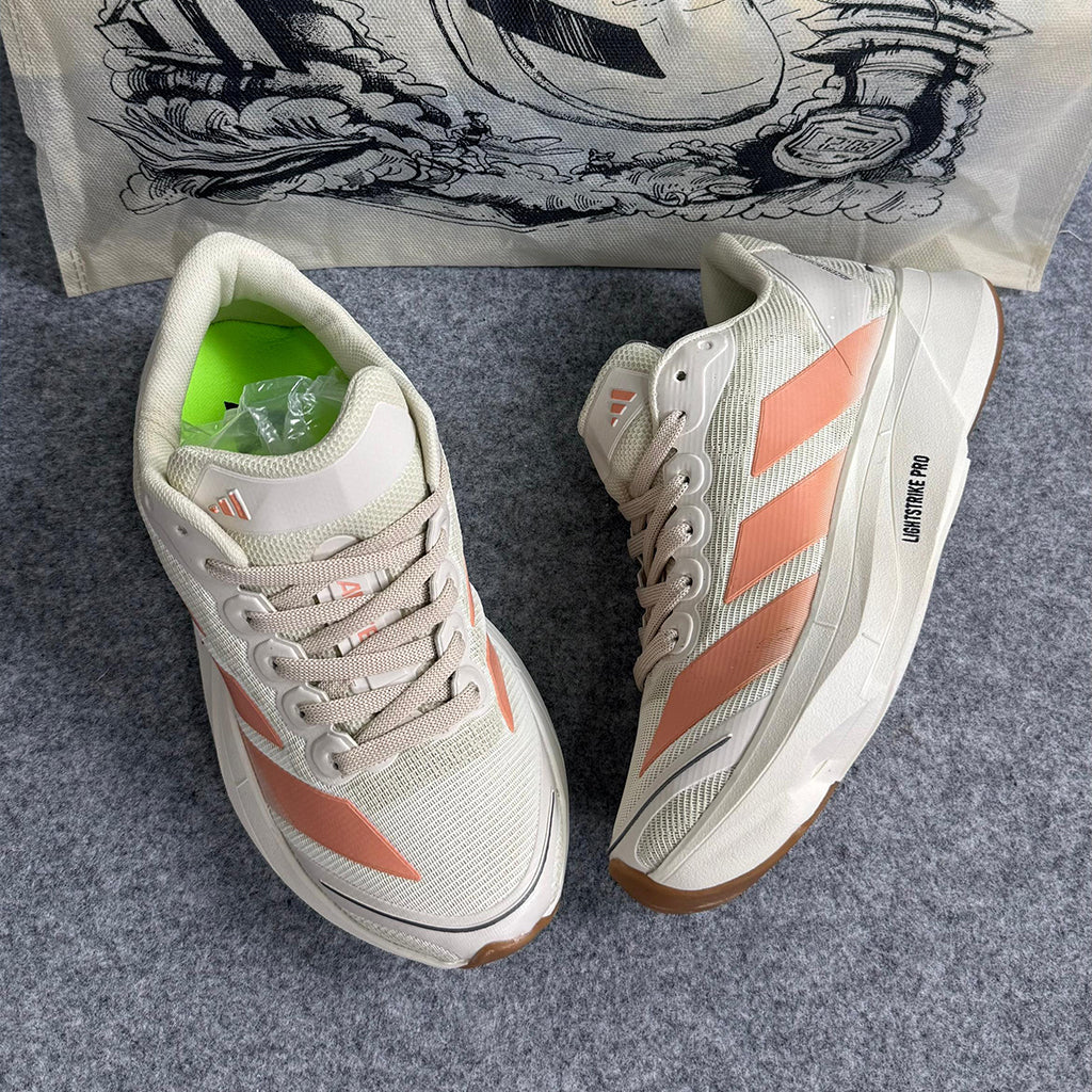 Tênis Adidas Boston 13 - Areia / Salmão