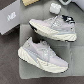 Tênis New Balance Fuel Cell Rebel - Cinza Full