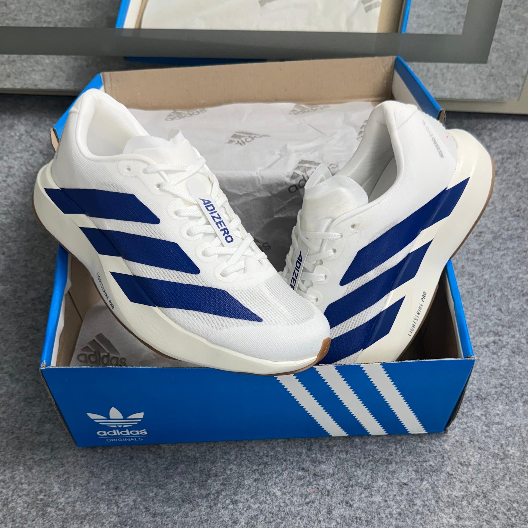 Tênis Adidas Adizero Evo SL - Off / Azul